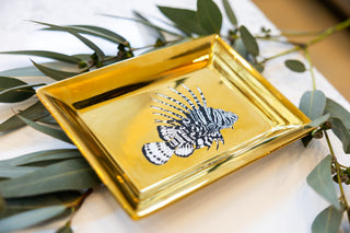Season and Stir™ Gold Reef Treasure Tray displayed with trinkets, showcasing its charm as a luxury decor accents item.