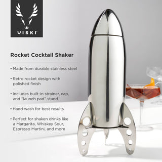 The Irving™ Stainless Steel Rocket Cocktail Shaker, complete with a display stand, illustrating the eye-catching aspect of this unique cocktail shaker.
