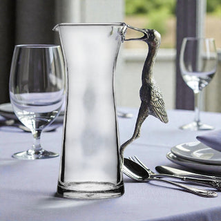 Close-up of the Egret Carafe/Pitcher highlighting the fine pewter egret motif, a luxurious unique glass carafe for any occasion.