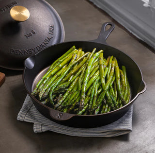 Side view of the Lancaster Cast Iron Skillet Number 8 emphasizing its 10.5-inch top diameter and lightweight construction.