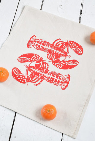 Season and Stir™ Oyster Tea Towel in Navy Blue or Lobster in Red